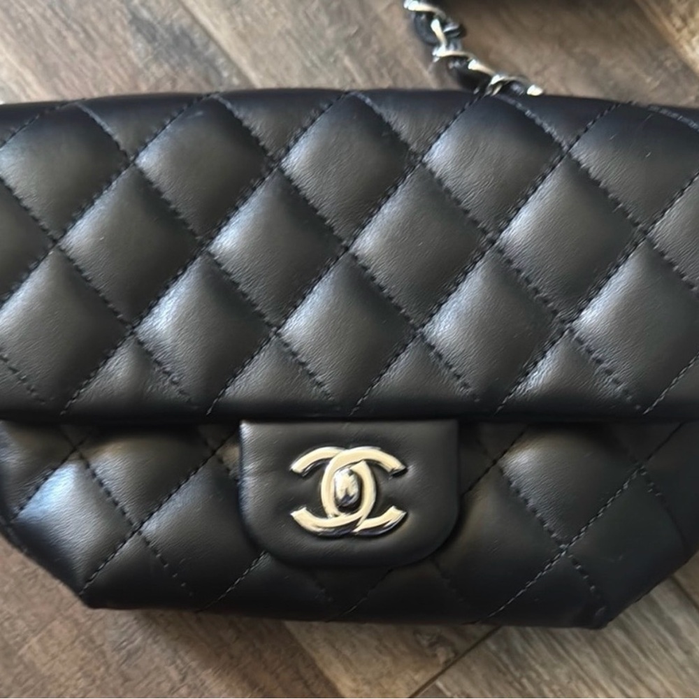 CHANEL Black Quilted Clutch with Silver Accents